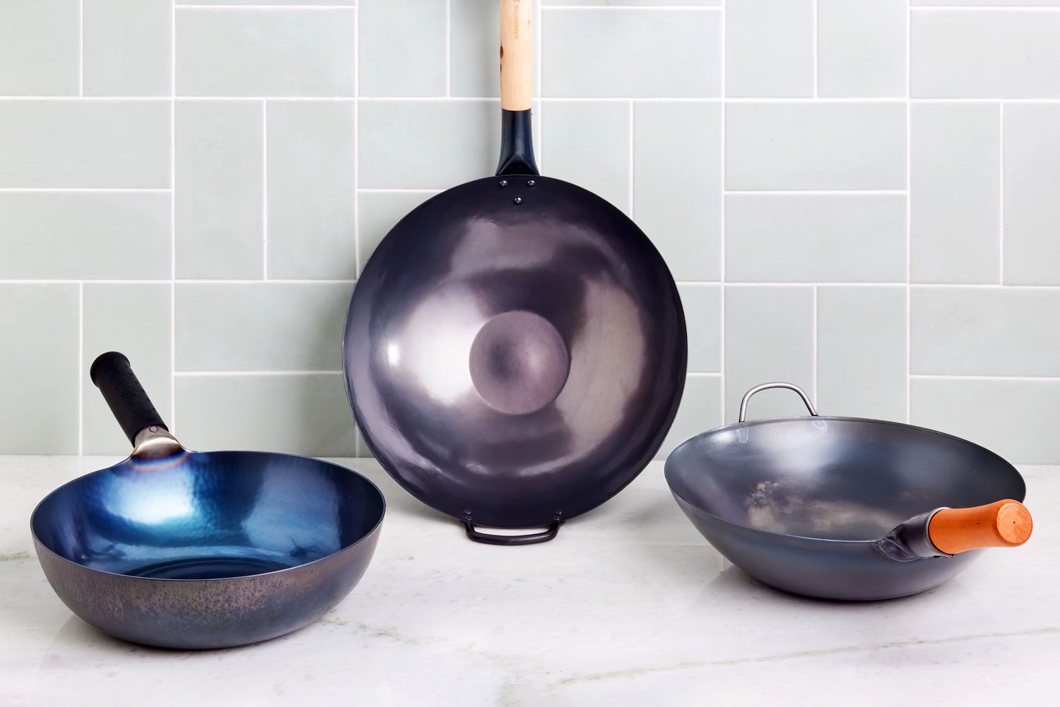 2026 Wok Buying guide: Carbon Steel vs. Stainless Steel for Home Chefs