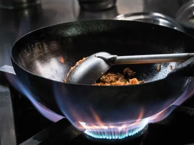 The Clash of Titans: Wok vs Frying Pan for Asian Cooking
