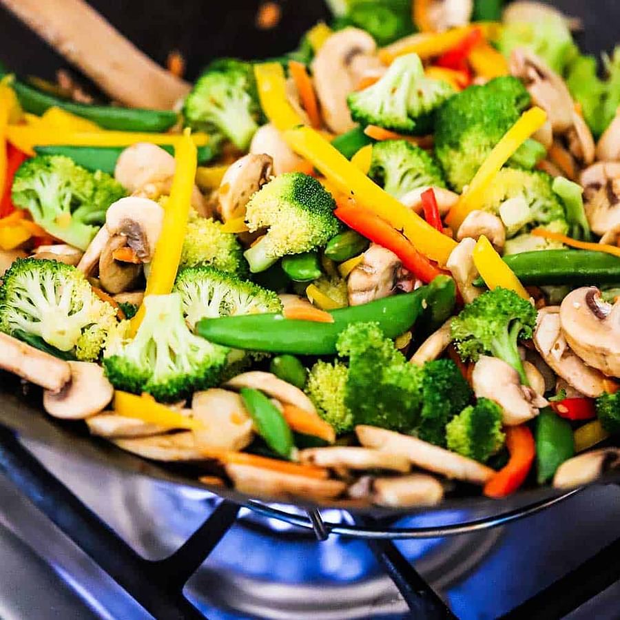Colorful vegetable stir fry in a wok
